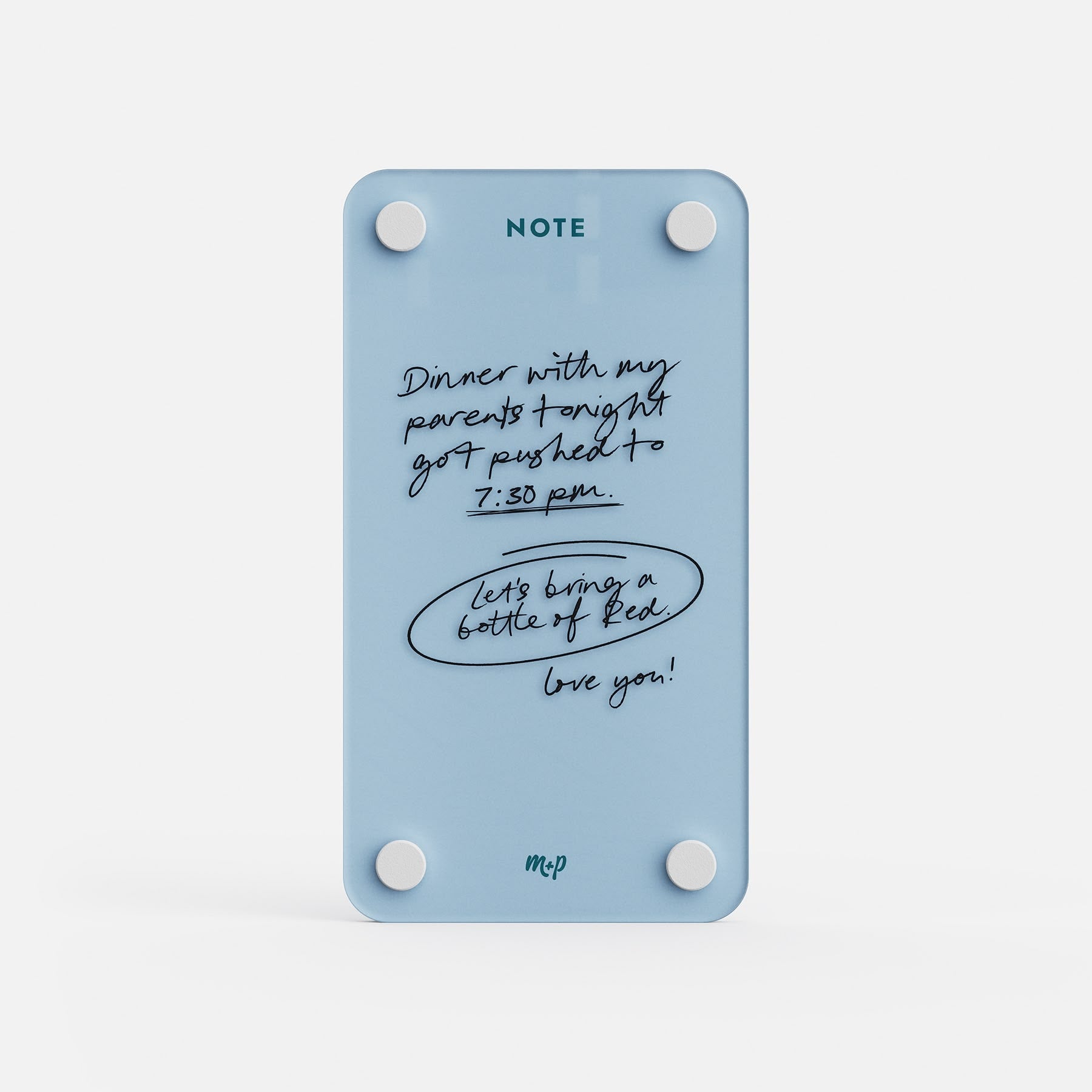 Vista blue tall magnetic acrylic note board with a handwritten message about dinner moving to 7:30